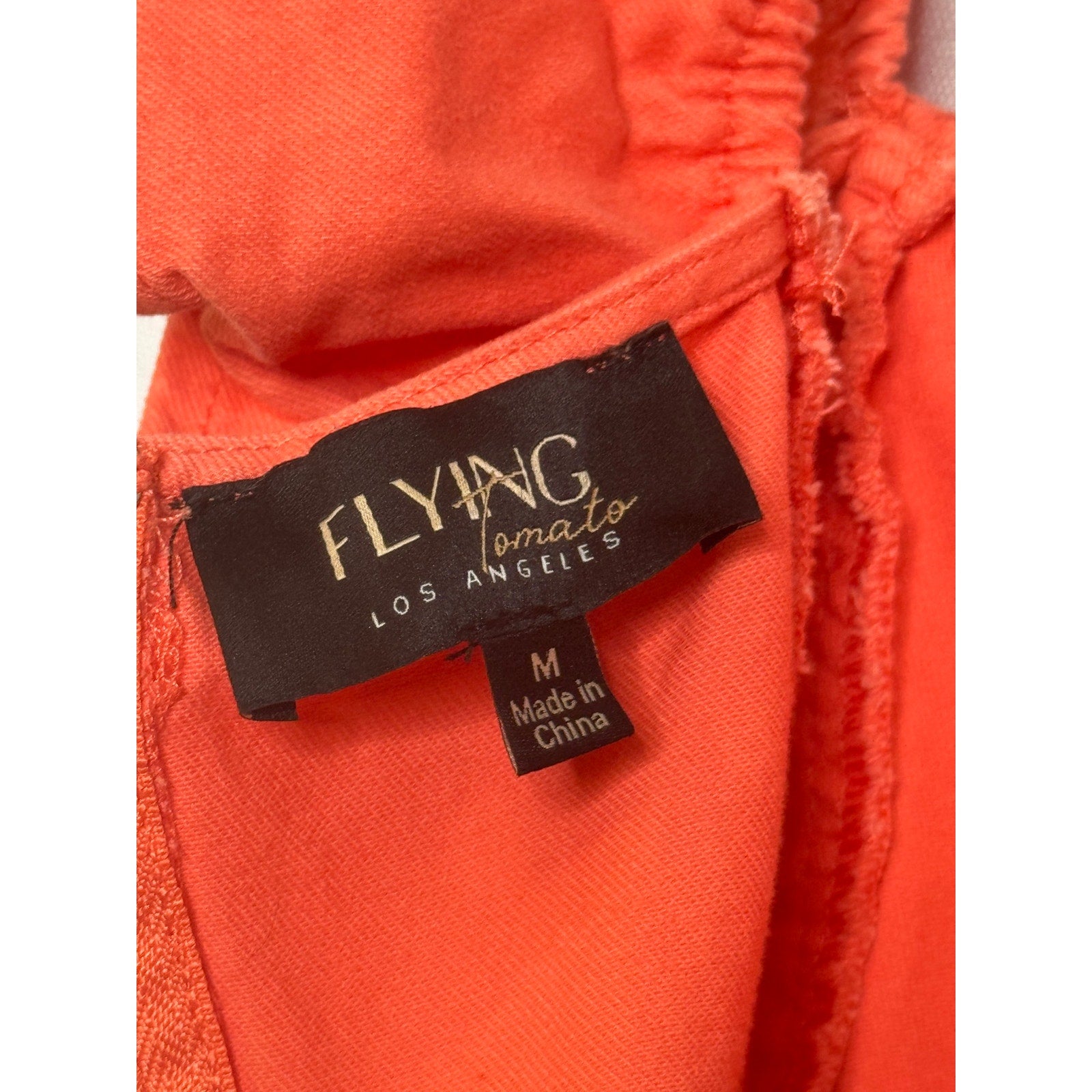 350. Flying Tomato Coral Ruffle Sleeve Romper Medium