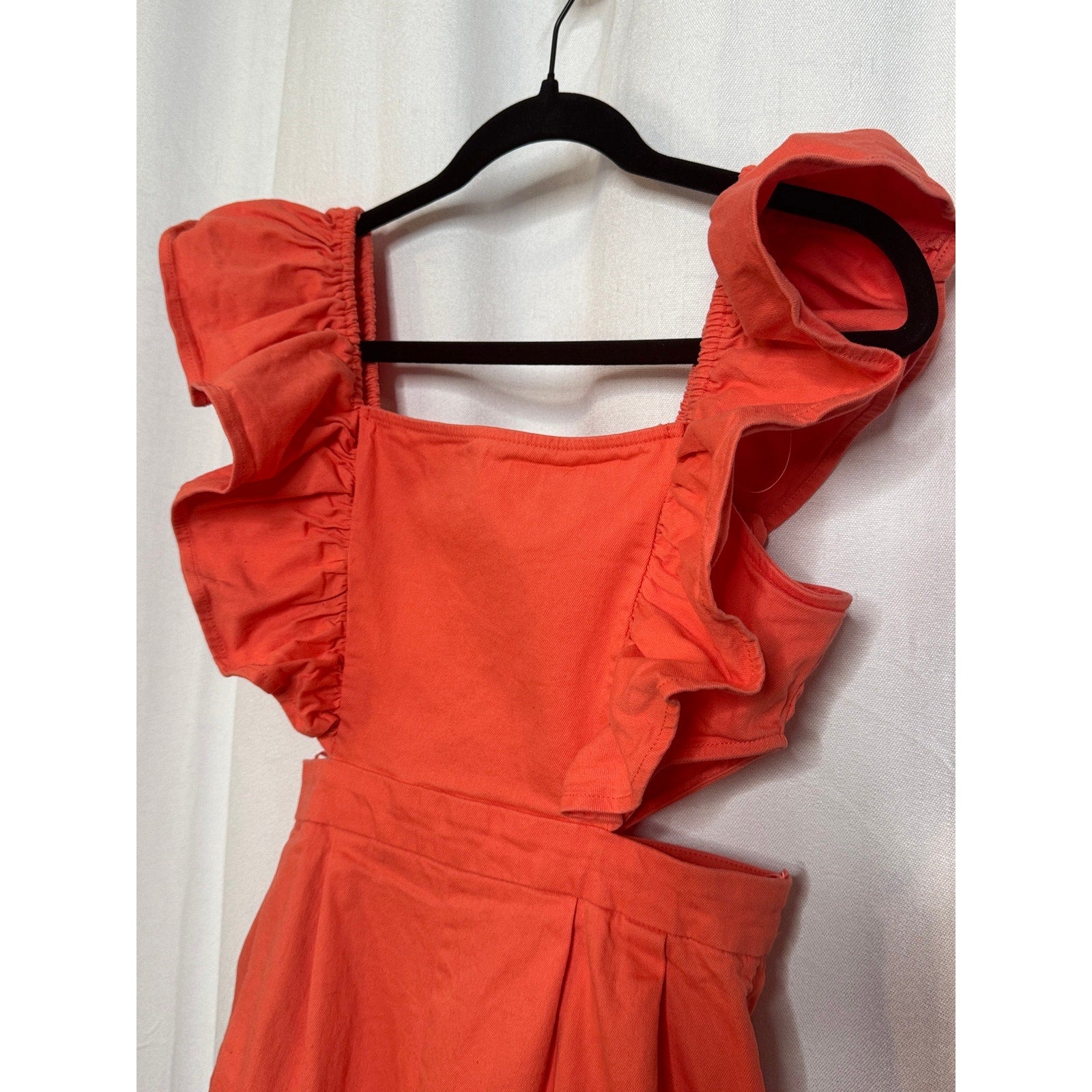 350. Flying Tomato Coral Ruffle Sleeve Romper Medium