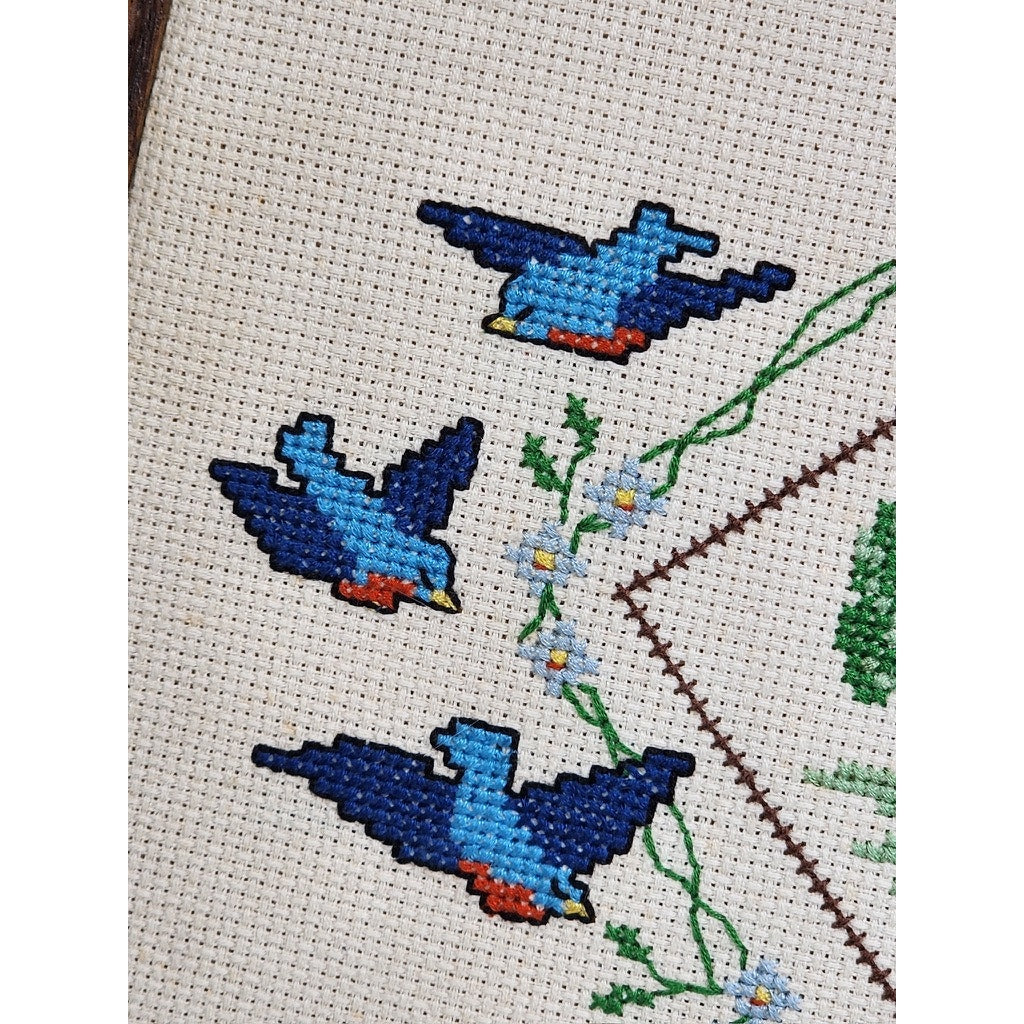 525. Framed Handcrafted Cross Stitch Bluebirds Landscape Wall Art